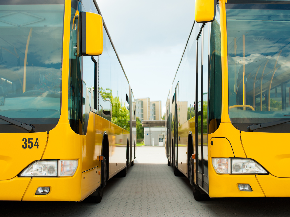 Yellow buses waiting to be dispatched