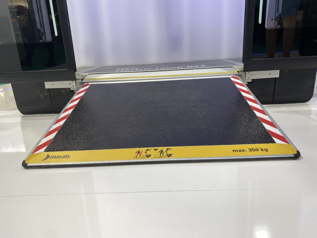 An image of an electric ramp for a bus