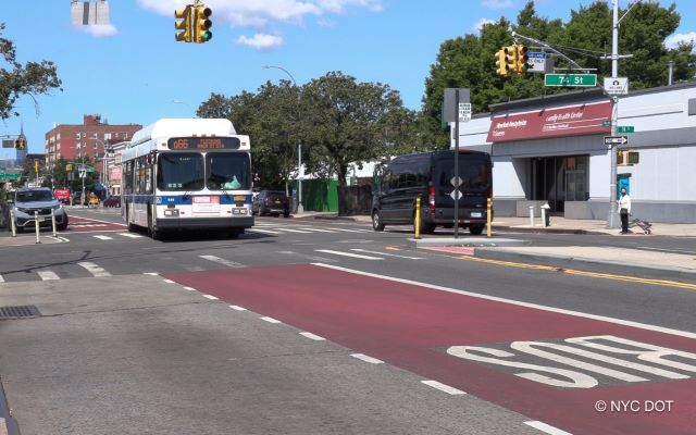 The Q66 bus using new offset bus lane on Northern Boulevard