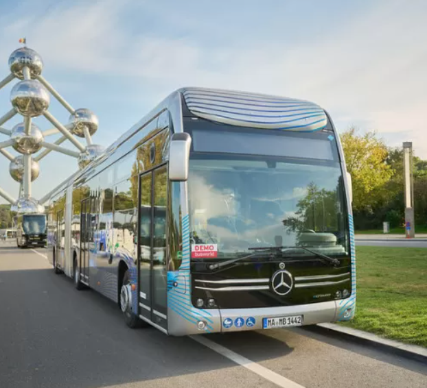 A bus travelling in the sun