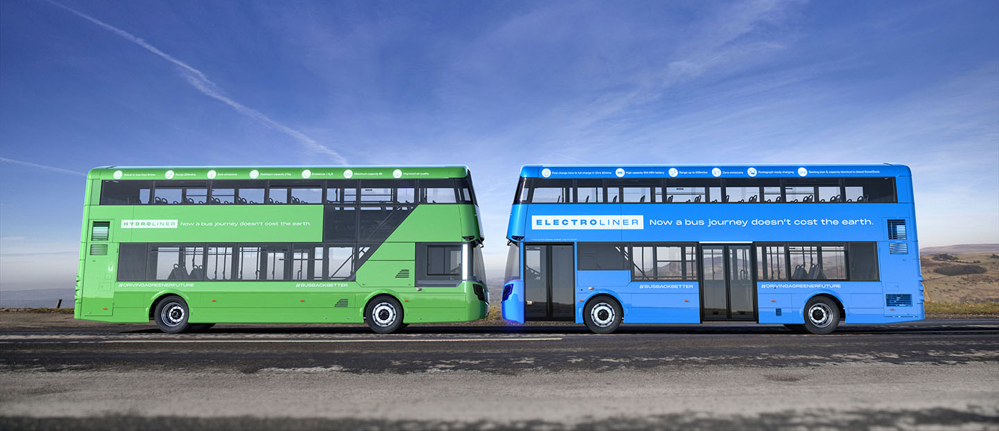 A green double decker bus and a blue double decker bus parked facing eachother