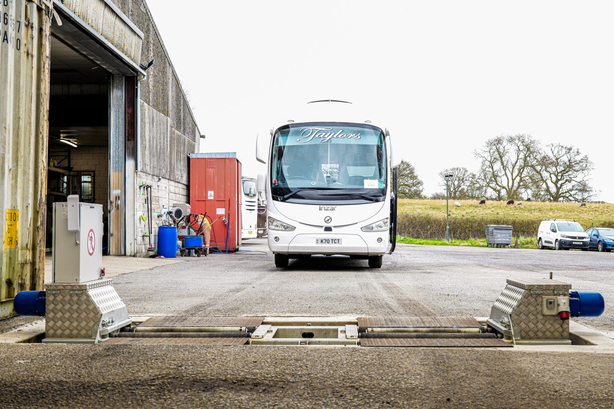Taylors Coach stationary at its station