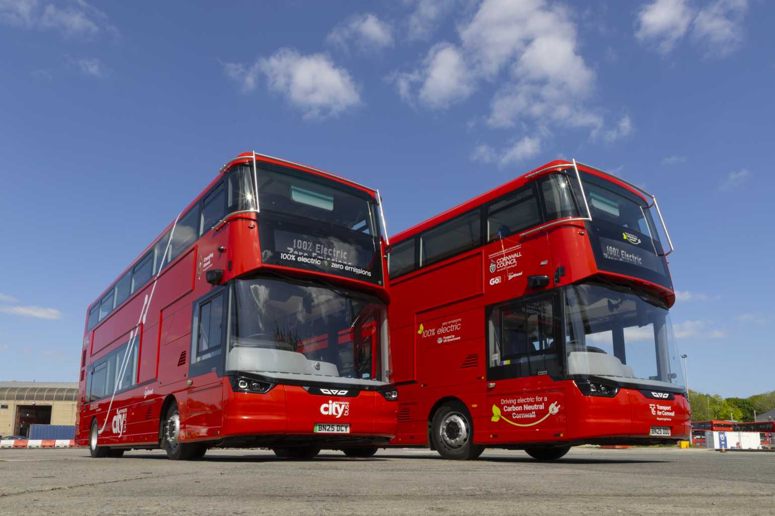 Two red electric buses in Plymouth's CityBus livery