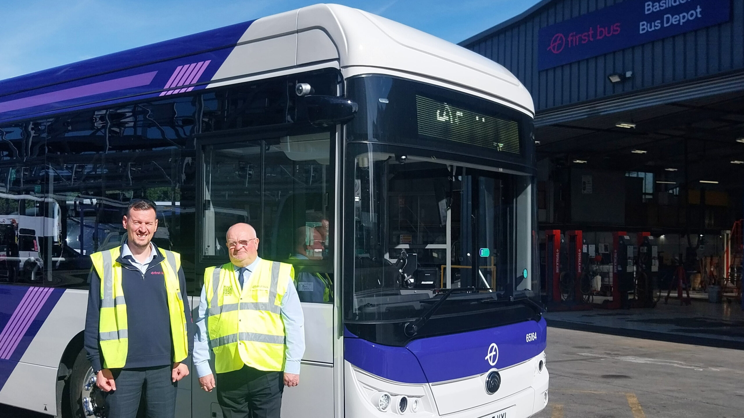 Dan Worley, Operations Manager and Piers Marlow, Managing Director with a new EV at the Basildon Depot
