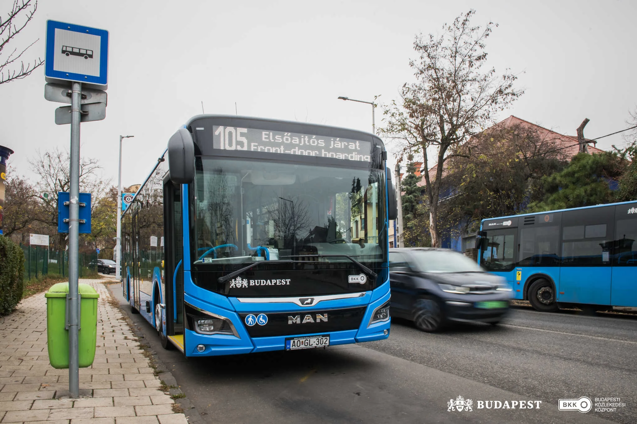 One of the new buses at a bus stop