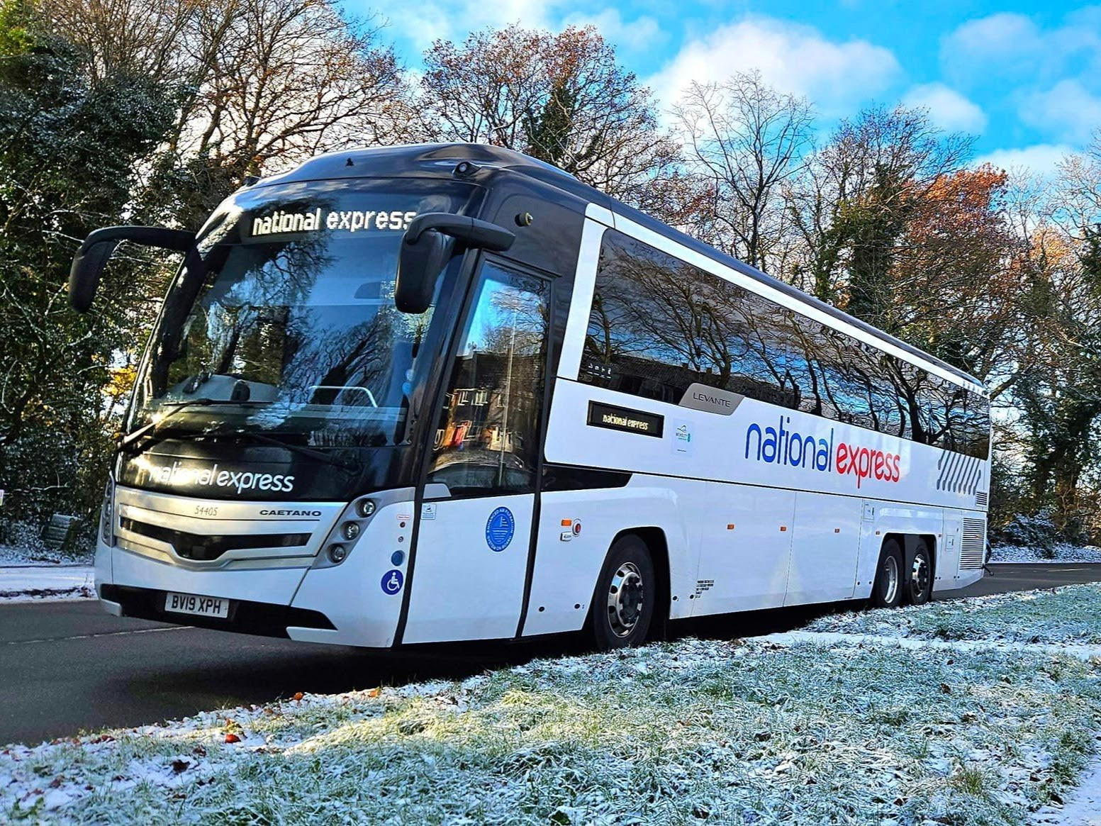 A National Express coach in the snow