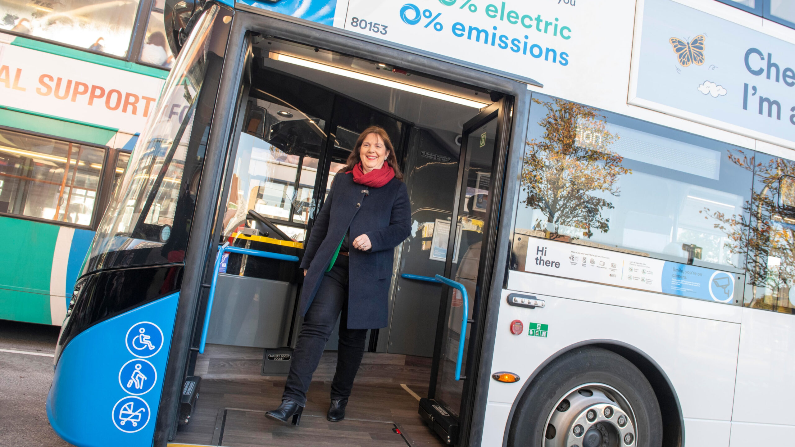 Mayor Claire getting off a bus