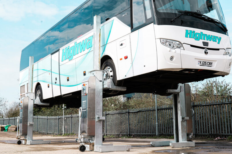 Coach raised by vehicle lifting equipment