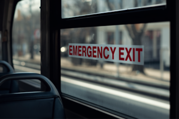 Emergency exit label on a bus window