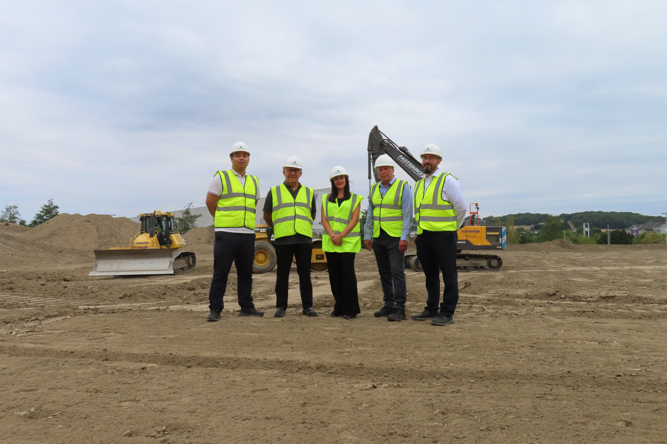 Members of Pelican Bus + Coach team mark the official groundbreakingceremony for the company’s new 40,000 sq ft warehouse