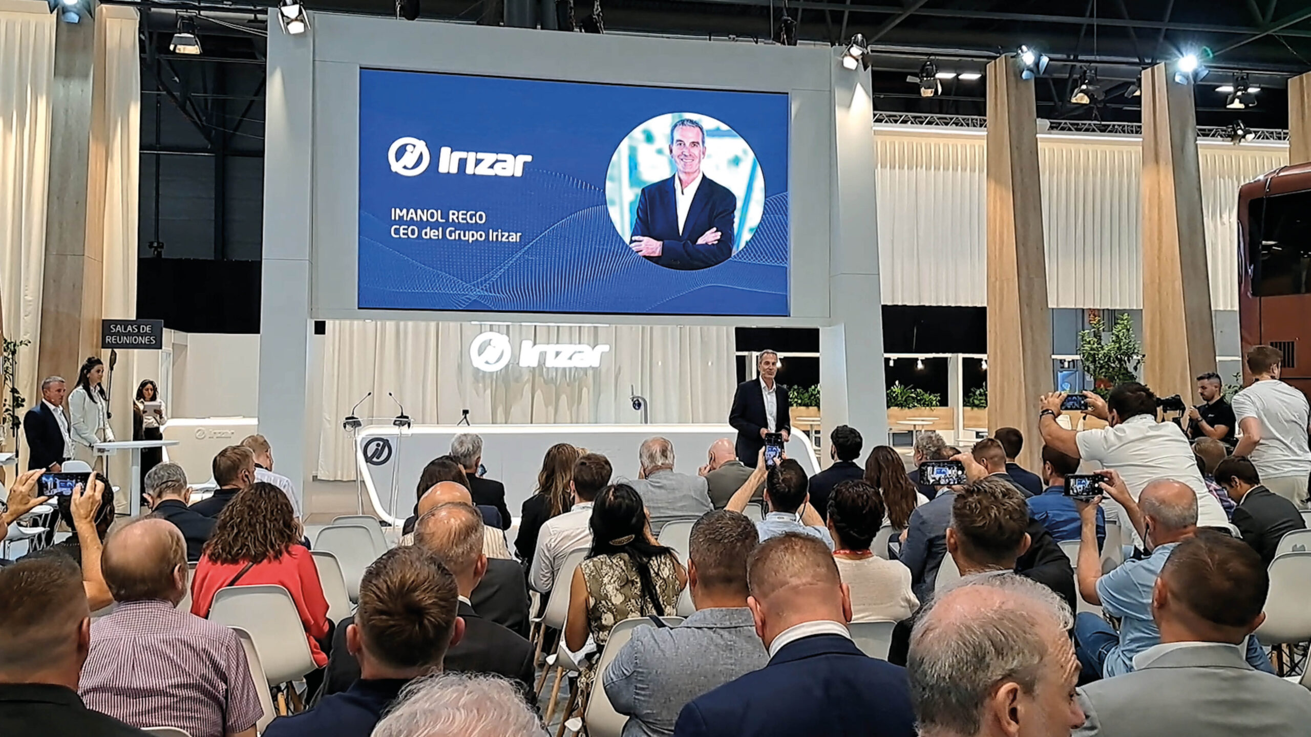 Irizar Group CEO Imanol Rego presenting to an audience at the Irizar stand at FIAA in Madrid