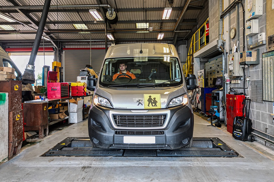 Monmouthshire County Council minibus on a Totalkare in-ground brake tester in the workshop