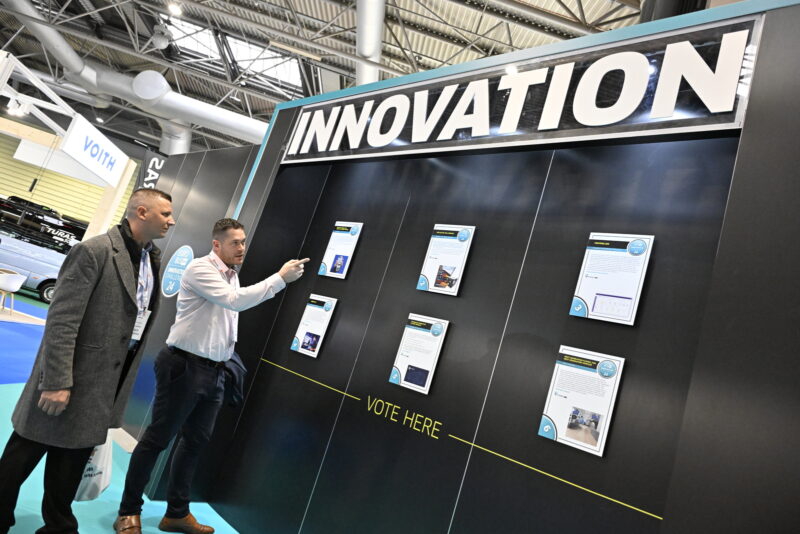 Attendees compare shortlisted entries on the Innovation Challenge voting wall at Euro Bus Expo 2024.